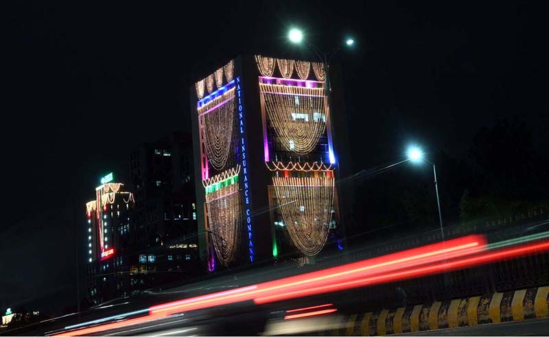 An illuminated view of the building of the Oil and Gas Development Company Limited in Islamabad.